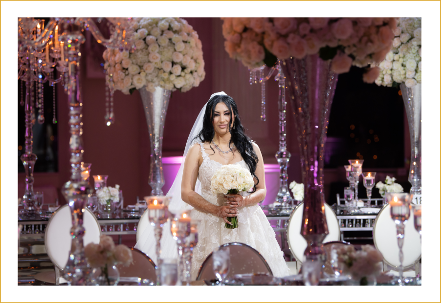 Bride holding flowers and smiling